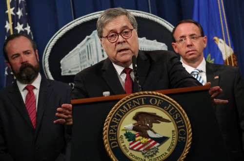 U.S. Attorney General William Barr, flanked by Edward O'Callaghan, Acting Principal Associate Deputy Attorney General (L) and Deputy U.S. Attorney General Rod Rosenstein, speaks at a news conference to discuss Special Counsel Robert Muellers report on Russian interference in the 2016 U.S. presidential race, in Washington, U.S., April 18, 2019. REUTERS/Jonathan Ernst - RC120324E830