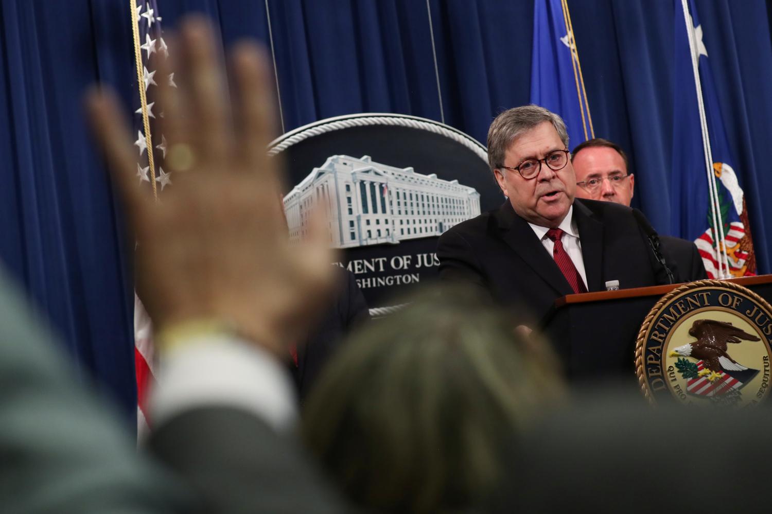 U.S. Attorney General William Barr, flanked by Deputy Attorney General Rod Rosenstein, speaks at a news conference to discuss Special Counsel Robert Mueller's report on Russian interference in the 2016 U.S. presidential race, in Washington, U.S., April 18, 2019. REUTERS/Jonathan Ernst - RC1E360BBAB0