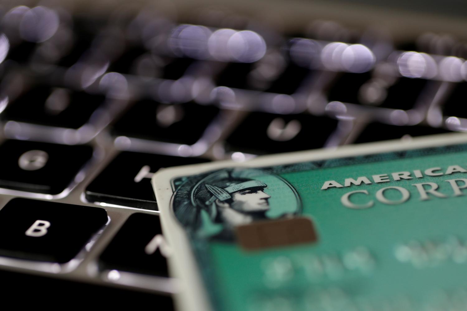An American Express credit card is seen on a computer keyboard in this picture illustration taken September 6, 2017. REUTERS/Philippe Wojazer/Illustration - RC12125F0520