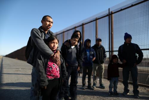 A group of Central American migrants surrenders to U.S. Border Patrol Agents south of the U.S.-Mexico border fence in El Paso, Texas, U.S., March 6, 2019.  REUTERS/Lucy Nicholson - RC1EFD427530