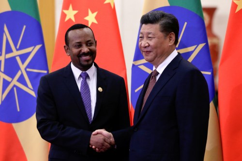 Ethiopia's Prime Minister Abiy Ahmed and China's President Xi Jinping shake hands before their bilateral meeting at the Great Hall of the People in Beijing, China September 2, 2018. Andy Wong/Pool via REUTERS - RC1970B5C210