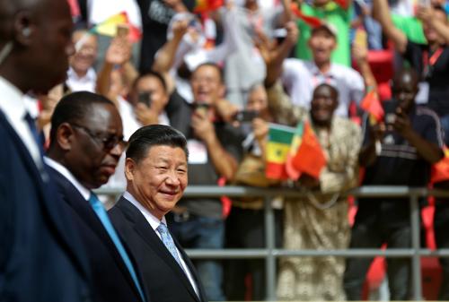 Senegal's President Macky Sall and Chinese President Xi Jinping enter the stadium during the opening ceremony of the Arene Nationale du Senegal in Dakar, Senegal July 22, 2018.  REUTERS/Mikal McAllister - RC1CB00541E0
