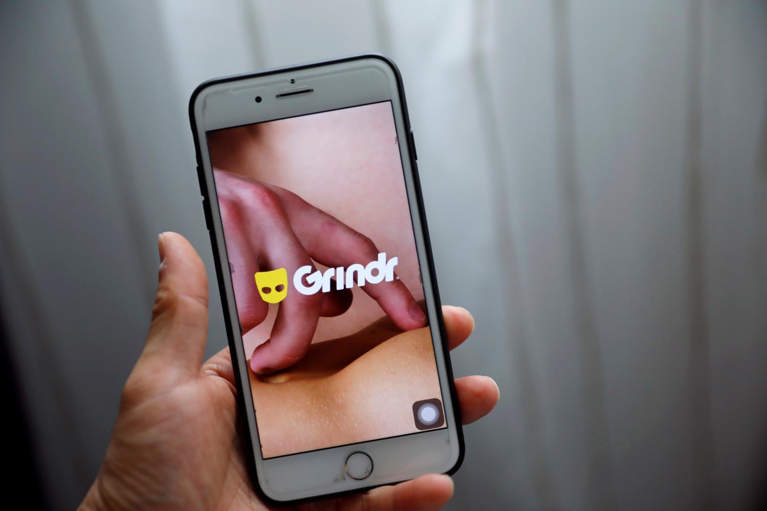Grindr app is seen on a mobile phone in this photo illustration taken in Shanghai, China March 28, 2019. REUTERS/Aly Song/Illustration - RC14EB466900