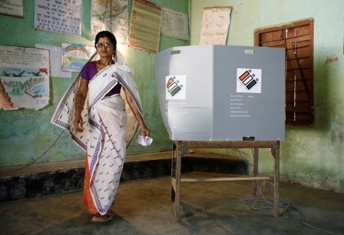 A woman leaves after casting her vote at a polling station during the first phase of general election in Majuli, a large river island in the Brahmaputra river, in the northeastern Indian state of Assam, India April 11, 2019. REUTERS/Adnan Abidi - RC11642136E0