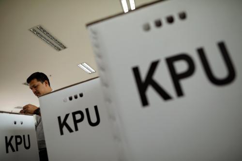 A man prepares election materials to be distributed to polling stations in Jakarta, Indonesia April 16, 2019. REUTERS/Edgar Su - RC1246850890