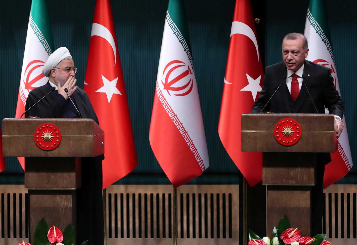 Turkish President Tayyip Erdogan and his Iranian counterpart Hassan Rouhani hold a joint news conference after their meeting in Ankara, Turkey, December 20, 2018. REUTERS/Umit Bektas - RC1D04743FA0