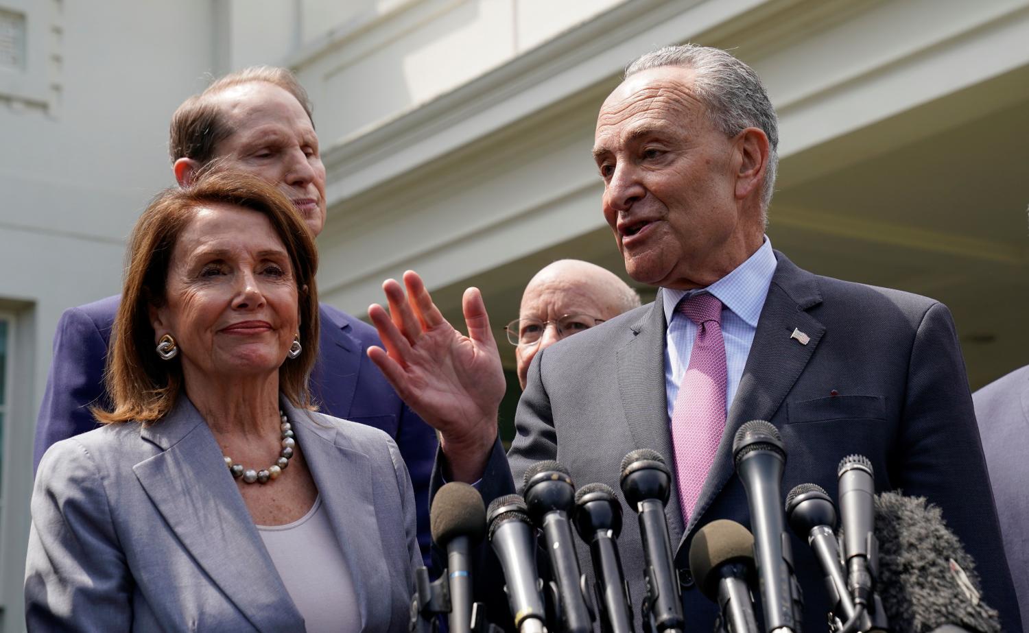 U.S. House Speaker Nancy Pelosi and Senate Democratic Leader Chuck Schumer speak to reporters after their meeting on infrastructure with U.S. President Donald Trump, at the White House in Washington, U.S., April 29, 2019.  REUTERS/Kevin Lamarque - RC151F7F92D0