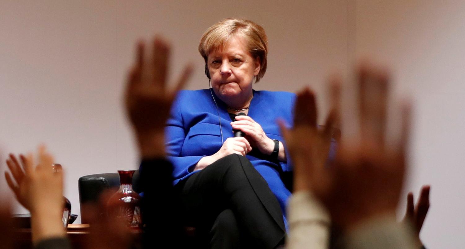 Students raise their hands to ask a question to German Chancellor Angela Merkel during her talk with students at Keio University in Tokyo, Japan, February 5, 2019. REUTERS/Issei Kato     TPX IMAGES OF THE DAY - RC119CD54670