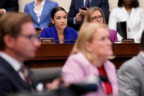 Rep. Alexandria Ocasio-Cortez (D-NY) looks on as bank ceos testify before a House Financial Services Committee hearing on "Holding Megabanks Accountable: A Review of Global Systemically Important Banks 10 Years After the Financial Crisis" on Capitol Hill in Washington, U.S., April 10, 2019. REUTERS/Aaron P. Bernstein - RC18D59A9B90