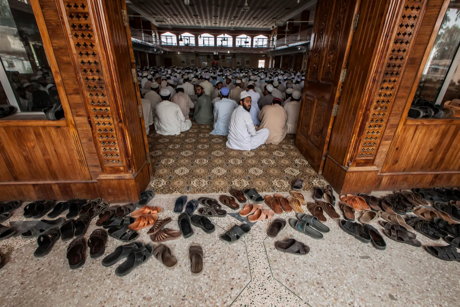 Pakistani religious students attend a lesson at Darul Uloom Haqqania, an Islamic seminary and alma mater of several Taliban leaders, in Akora Khattak, Khyber Pakhtunkhwa province September 14, 2013. The seminary, founded in 1947, is now one of biggest and most respected Islamic institutions in South Asia. It propagates a hard-line curriculum based on the radical Deobandi strain of Sunni Islam. Picture taken September 14, 2013. To match story PAKISTAN-TALIBAN/ REUTERS/Zohra Bensemra (PAKISTAN - Tags: POLITICS EDUCATION RELIGION TPX IMAGES OF THE DAY) - GM1E99F1AX201