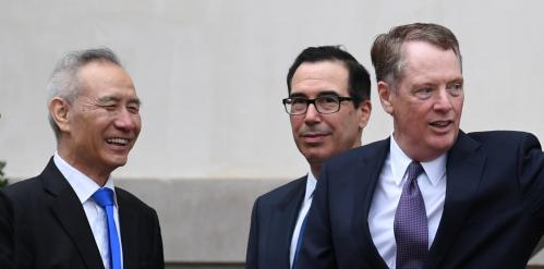 Chinese Vice Premier Liu He talks with U.S. Treasury Secretary Steven Mnuchin and U.S. Trade Representative Robert Lighthizer as he arrives at the office of the U.S. Trade Representative for further trade talks in Washington, U.S., May 10, 2019. REUTERS/Clodagh Kilcoyne - RC17126E5A90