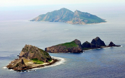 A part of the disputed islands in the East China Sea, known as the Senkaku isles in Japan, Diaoyu in China, is seen in the East China Sea in this aerial view photo taken in October, 2010. A member of Japan's Coast Guard admitted on Wednesday putting a video of a collision between a Chinese trawler and Japanese patrol boats on the Internet , a development that could hurt efforts to mend bilateral ties. Relations between Asia's biggest economies have chilled since September, when Japan detained the Chinese skipper of the fishing boat after it crashed into Coast Guard ships near disputed isles in the East China Sea. REUTERS/Kyodo (JAPAN - Tags: POLITICS) FOR EDITORIAL USE ONLY. NOT FOR SALE FOR MARKETING OR ADVERTISING CAMPAIGNS. JAPAN OUT. NO COMMERCIAL OR EDITORIAL SALES IN JAPAN.  THIS IMAGE HAS BEEN SUPPLIED BY A THIRD PARTY. IT IS DISTRIBUTED, EXACTLY AS RECEIVED BY REUTERS, AS A SERVICE TO CLIENTS - GM1E6BA1HB901