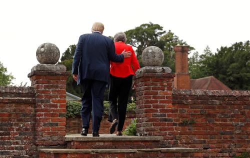 U.S. President Donald Trump and British Prime Minister Theresa May depart their press conference after their meeting at Chequers in Buckinghamshire, Britain July 13, 2018. REUTERS/Kevin Lamarque - RC1A3A201000