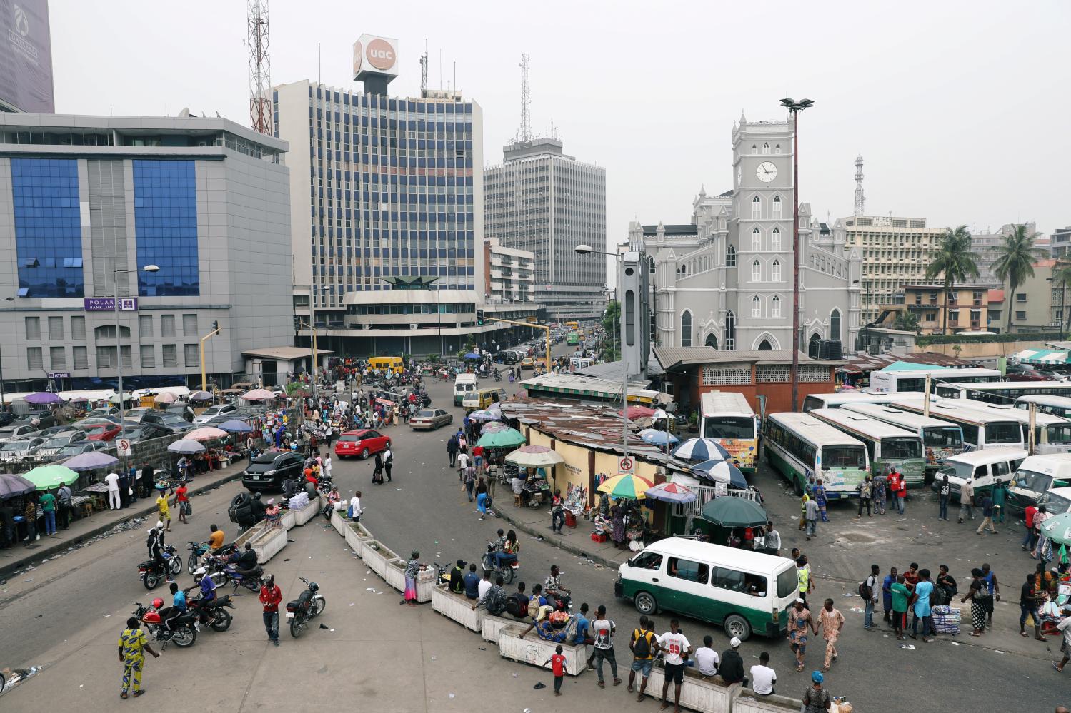 People move on a street of Marina in Victoria Island, Lagos, Nigeria February 15, 2019. REUTERS/Temilade Adelaja - RC1AA6282BF0