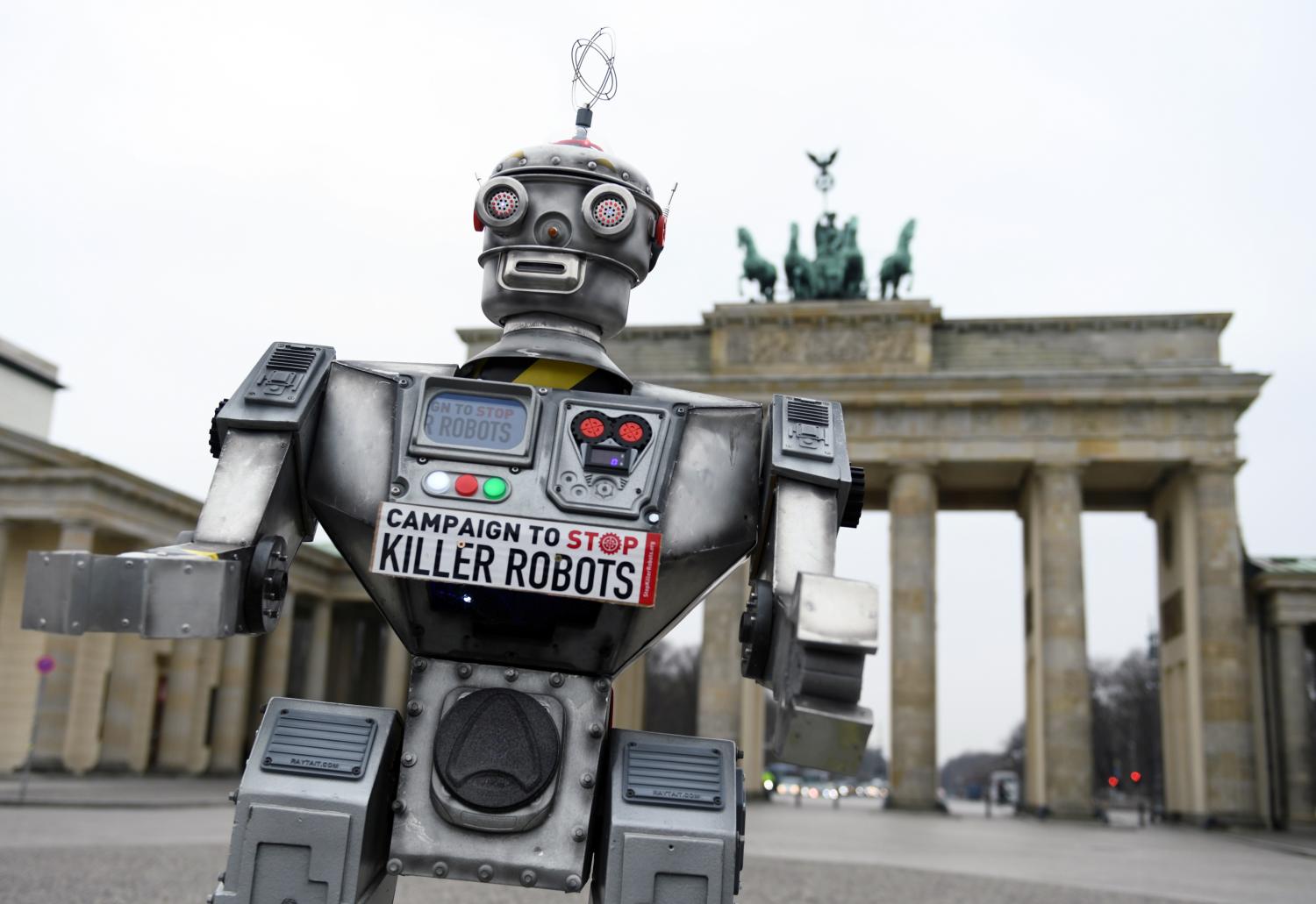 Activists from the Campaign to Stop Killer Robots, a coalition of non-governmental organisations opposing lethal autonomous weapons or so-called 'killer robots', stage a protest at Brandenburg Gate in Berlin, Germany, March, 21, 2019. REUTERS/Annegret Hilse - RC17B0F5E300