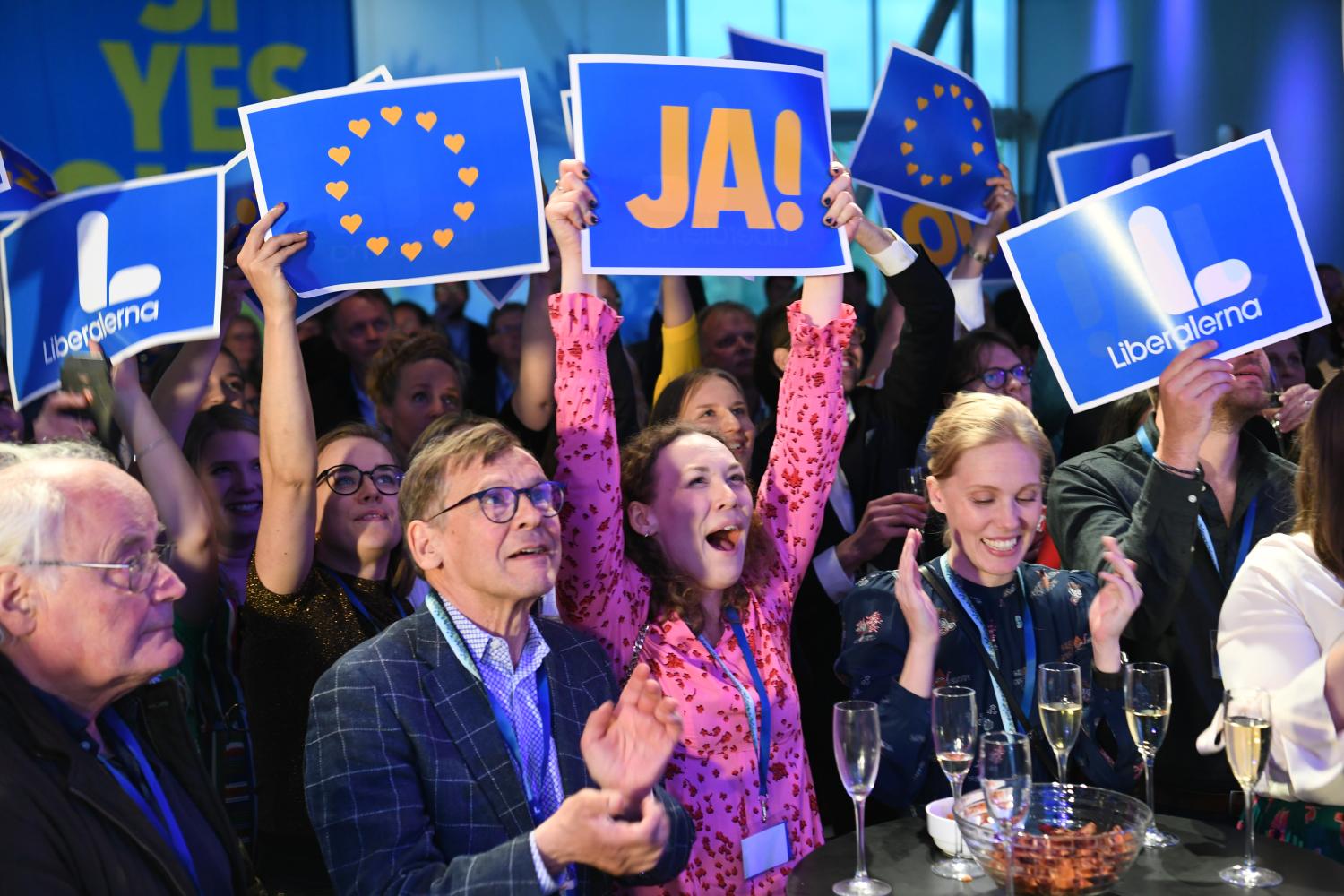 Party members celebrate during the Liberal party (Liberalerna) election night watch party in Stockholm, Sweden on May 26, 2019. TT News Agency/Fredrik Sandberg/via REUTERS ATTENTION EDITORS - THIS IMAGE WAS PROVIDED BY A THIRD PARTY. SWEDEN OUT. - RC18375151D0