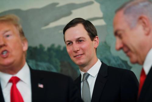 White House senior advisor Jared Kushner smiles while listening to U.S. President Donald Trump talk as the president meets with Israel's Prime Minister Benjamin Netanyahu at the White House in Washington, U.S., March 25, 2019. REUTERS/Carlos Barria     TPX IMAGES OF THE DAY - RC188FAA0870
