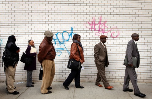 Jobseekers stand in line to attend the Dr. Martin Luther King Jr. career fair held by the New York State department of Labor in New York, U.S. on April 12, 2012.       REUTERS/Lucas Jackson/File Photo - TM3EC770USI01