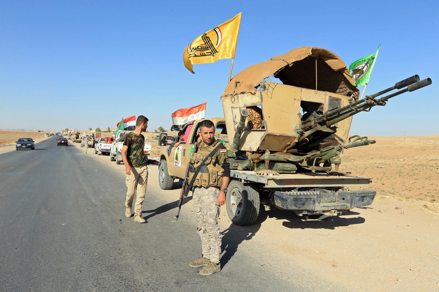 Shi'ite Popular Mobilization Forces (PMF) are seen in Zumar, Nineveh province, Iraq October 18, 2017. REUTERS/Ari Jalal - RC1E698CF530