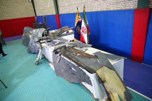 REFILE - UPDATING BYLINE The purported wreckage of the American drone is seen displayed by the Islamic Revolution Guards Corps (IRGC) in Tehran, Iran June 21, 2019. Meghdad Madadi/Tasnim News Agency/Handout via REUTERS ATTENTION EDITORS - THIS IMAGE WAS PROVIDED BY A THIRD PARTY. - RC1CF0139CF0