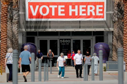 People come and go from the Registrar of Voters office on the final day of voter registration in the upcoming congressional elections in San Diego, California, U.S. October 22, 2018.  REUTERS/Mike Blake - RC1956981AF0