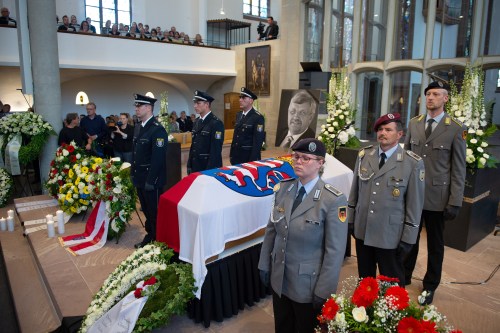 An honour guard made of Police and Federal Armed Force officers stands next to the coffin of the Kassel District President, Walter Luebcke, who was shot, during his funeral at the St. Martin Church in Kassel, Germany, June 13, 2019. Swen Pfoertner/Pool via REUTERS - RC16A0A44800