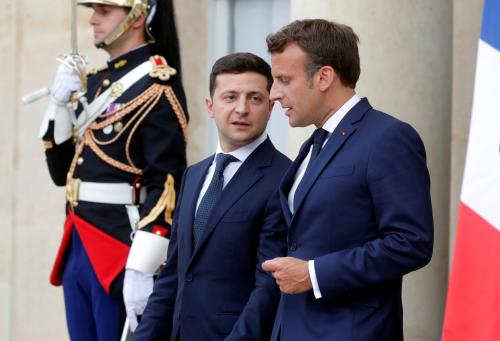 French President Emmanuel Macron and Ukrainian President Volodymyr Zelenskiy leave after a news conference at the Elysee Palace in Paris, France June 17, 2019. REUTERS/Philippe Wojazer - RC1E8D935900
