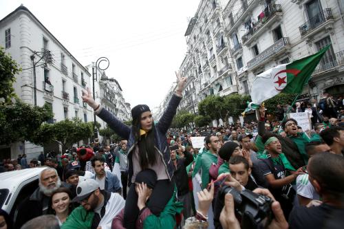 Demonstrators hold flags and banners during peaceful anti-government protests in Algiers, Algeria, May 3, 2019. REUTERS/Ramzi Boudina TPX IMAGES OF THE DAY - RC17A25952E0