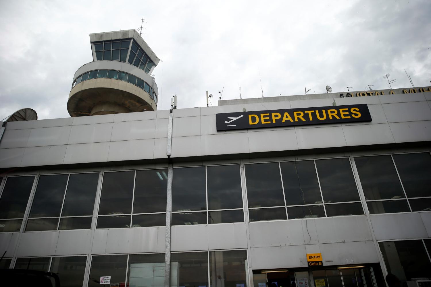 A view showing the tower and departure sign outside the Murtala Mohammed International airport in Nigeria's commercial capital Lagos, May 11, 2017. REUTERS/Akintunde Akinleye - RC1A51F62B00