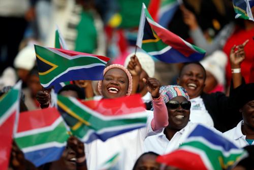 Guests sing as they arrive for the inauguration of Cyril Ramaphosa as President, at Loftus Versveld stadium in Pretoria, South Africa, May 25, 2019. REUTERS/Siphiwe Sibeko - RC17E4818CD0