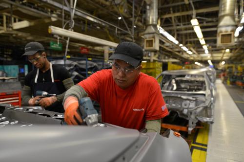 Line workers install the trunk on the flex line at Nissan Motor Co's automobile manufacturing plant in Smyrna, Tennessee, U.S., August 23, 2018. Picture taken August 23, 2018. REUTERS/William DeShazer - RC1C371372F0