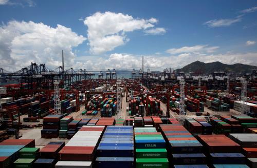 Containers are piled up at Kwai Chung Container Terminals in Hong Kong July 6, 2012. REUTERS/Bobby Yip/File Photo - D1AETJBXVIAB