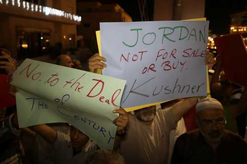 Members of the Muslim Brotherhood take part in a sit-in against the Senior White House Advisor Jared Kushner's visit to Jordan, near the U.S. Embassy, in Amman, Jordan, May 28, 2019. Picture taken May 28, 2019. REUTERS/Muhammad Hamed - RC16915627A0