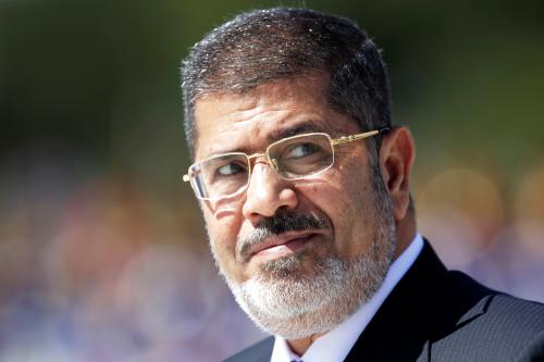 Egypt's President Mohamed Mursi reviews the troops in an official ceremony before a meeting with Brazil's President Dilma Rousseff at the Planalto Palace in Brasilia May 8, 2013. REUTERS/Ueslei Marcelino (BRAZIL - Tags: POLITICS HEADSHOT) - GM1E9581SLF01