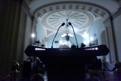 Microphones wait for senators to speak after Senate Democratic and Republican caucus luncheons at the U.S. Capitol in Washington, October 15, 2013. Republicans in the House of Democratic failed to reach internal consensus on Tuesday on how to break an impasse on the federal budget that could soon result in an economically damaging default on the country's debt.  REUTERS/Jonathan Ernst    (UNITED STATES - Tags: POLITICS BUSINESS) - GM1E9AG05TF01