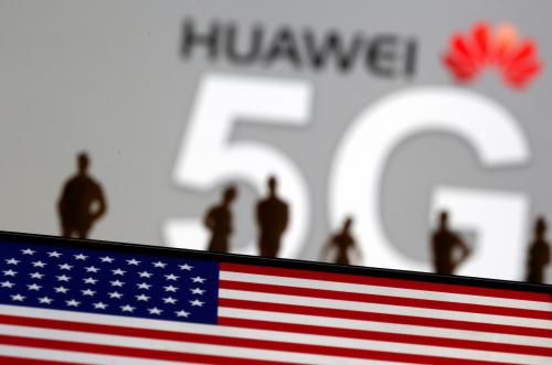 Small toy figures are seen in front of a displayed Huawei and 5G network logo in this illustration picture, March 30, 2019. REUTERS/Dado Ruvic/Illustration - RC14A76AF5F0