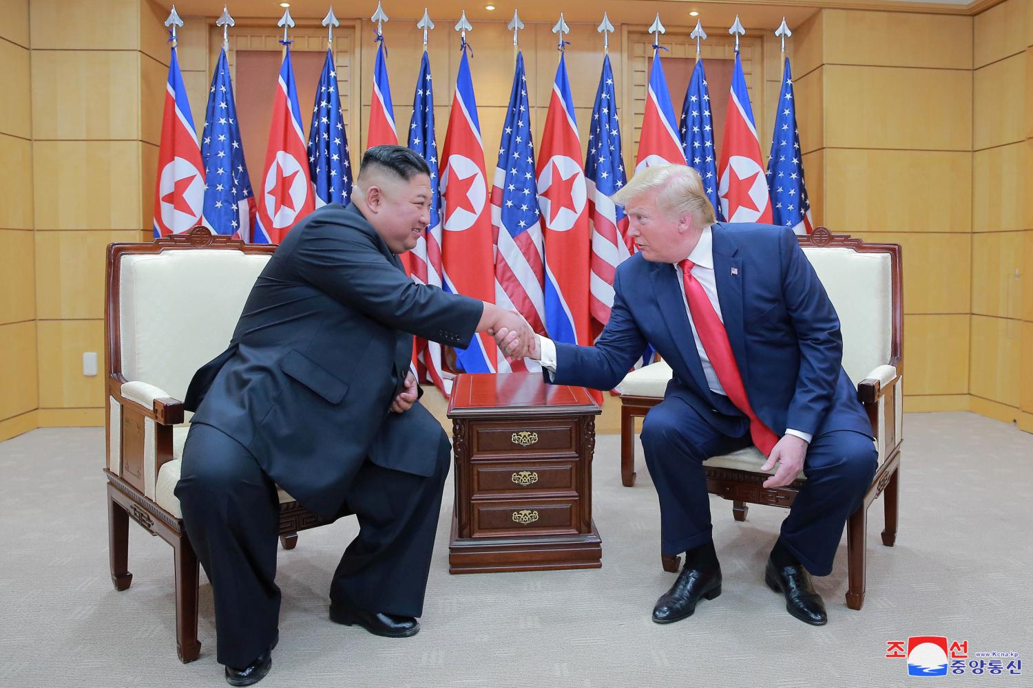 U.S. President Donald Trump and North Korean leader Kim Jong Un shake hands during a meeting at the demilitarized zone (DMZ) separating the two Koreas, in Panmunjom, South Korea, June 30, 2019. KCNA via REUTERS    ATTENTION EDITORS - THIS IMAGE WAS PROVIDED BY A THIRD PARTY. REUTERS IS UNABLE TO INDEPENDENTLY VERIFY THIS IMAGE. NO THIRD PARTY SALES. SOUTH KOREA OUT. NO COMMERCIAL OR EDITORIAL SALES IN SOUTH KOREA. - RC1484CCD790