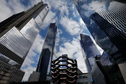 The Hudson Yards development on Manhattan's West side, which will have more than 18 million square feet of commercial and residential space and 14 acres of public parks and gardens including "The Vessel" (C) is seen New York City, New York, U.S., March 12, 2019. REUTERS/Mike Segar - RC1DF81C4870