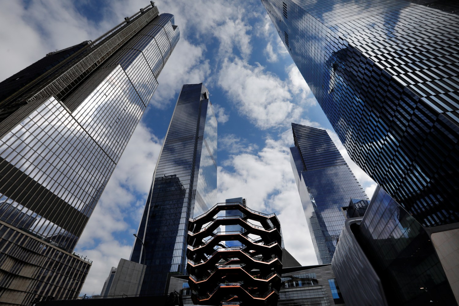 The Hudson Yards development on Manhattan's West side, which will have more than 18 million square feet of commercial and residential space and 14 acres of public parks and gardens including "The Vessel" (C) is seen New York City, New York, U.S., March 12, 2019. REUTERS/Mike Segar - RC1DF81C4870