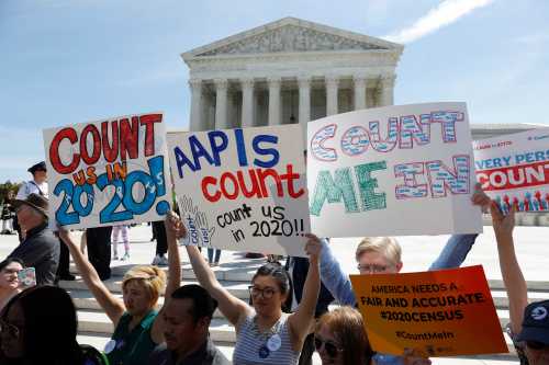 Demonstrators gather outside the U.S. Supreme Courthouse in Washington, U.S., April 23, 2019. REUTERS/Shannon Stapleton - RC198137D7A0