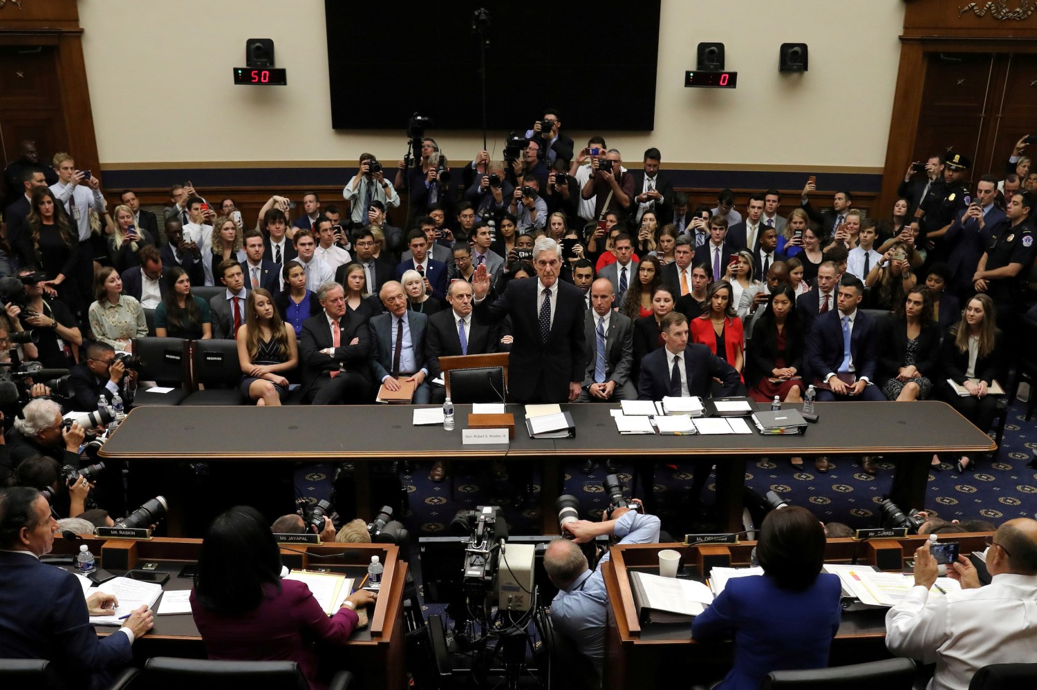 Former special counsel Robert Mueller is sworn in before testifying to the House Judiciary Committee about his report on Russian interference in the 2016 presidential election in the Rayburn House Office Building, in Washington, D.C., U.S. July 24, 2019.  Chip Somodevilla/Pool via Reuters - RC18639DA8F0