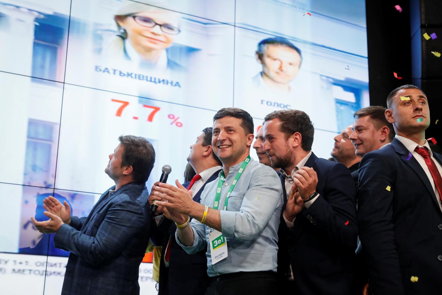 Ukraine's President Volodymyr Zelenskiy reacts at his party's headquarters after a parliamentary election in Kiev, Ukraine July 21, 2019. REUTERS/Valentyn Ogirenko - RC1A42CA5120