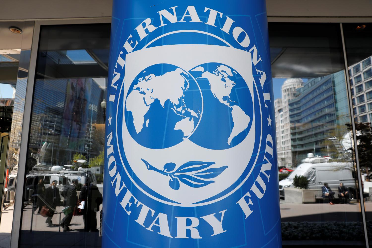 International Monetary Fund logo is seen outside the headquarters building during the IMF/World Bank spring meeting in Washington, U.S., April 20, 2018. REUTERS/Yuri Gripas - RC13CB8CD000