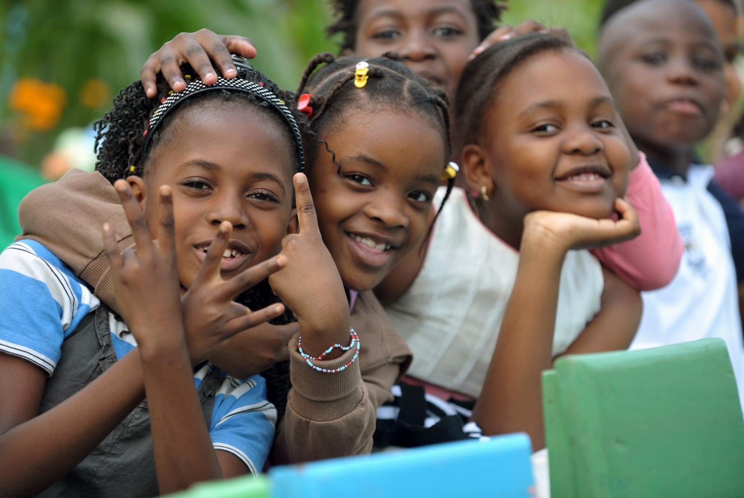 Children wait for the arrival of Belgium's King Albert II at the Belgian School in Kinshasa June 29, 2010. Belgian King Albert II is on a three-day official visit to Congo to attend the celebrations of the 50th anniversary of independence.  REUTERS/Frederic Sierakowski/Pool (DEMOCRATIC REPUBLIC OF CONGO - Tags: POLITICS) - GM1E66U00ND01