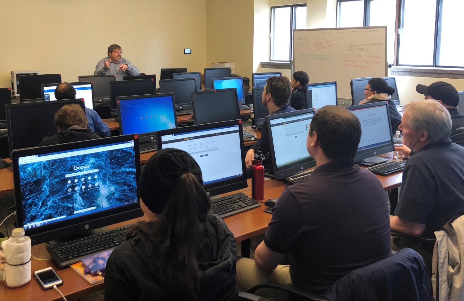 Patrick McHugh lectures to an information technology class at the Milwaukee Area Technical College in Milwaukee, Wisconsin, U.S., March 28, 2019.  Photo taken March 28, 2019.  REUTERS/Howard Schneider - RC1EAFE78850