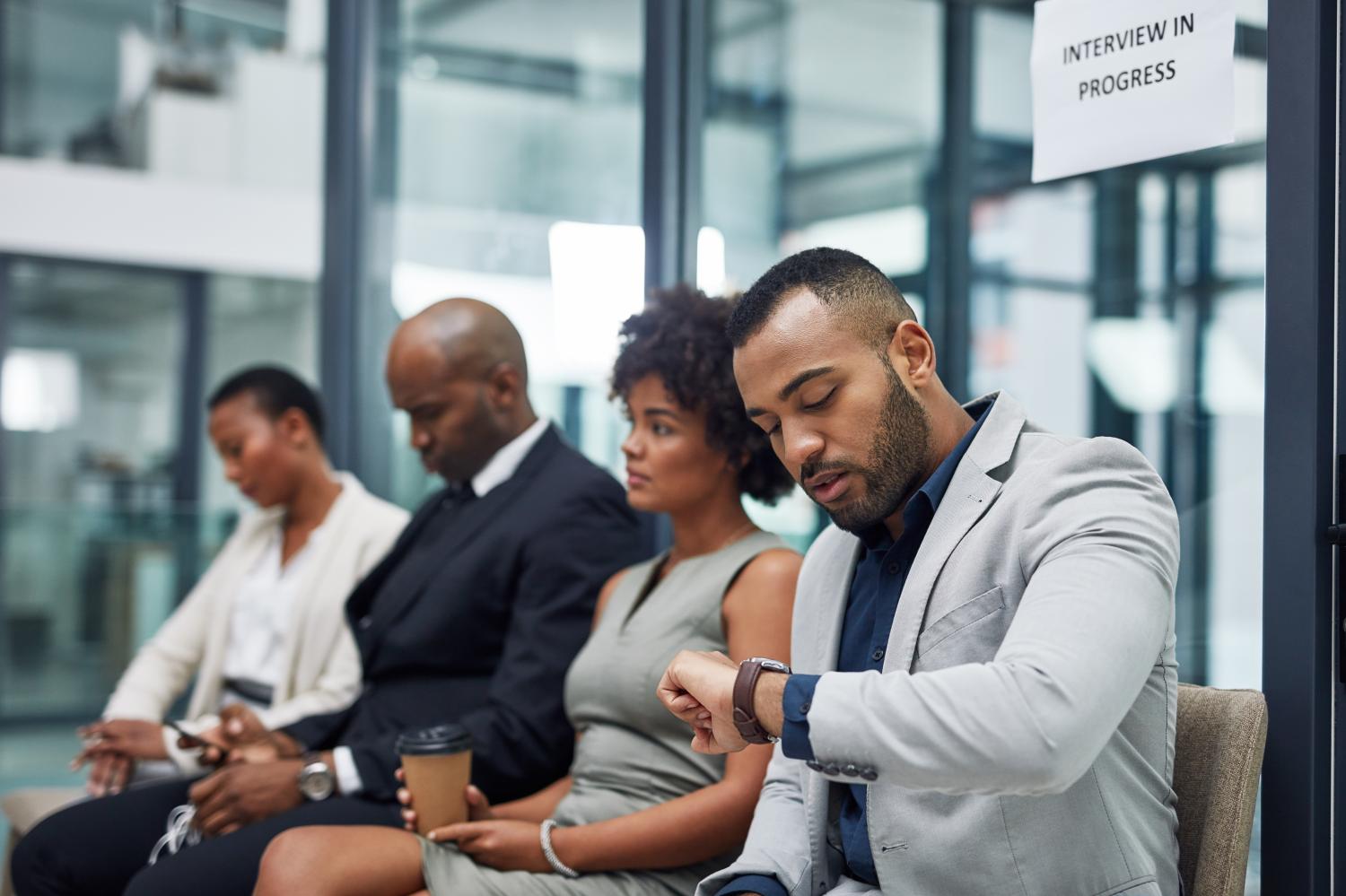 Three African Americans waiting for job interview