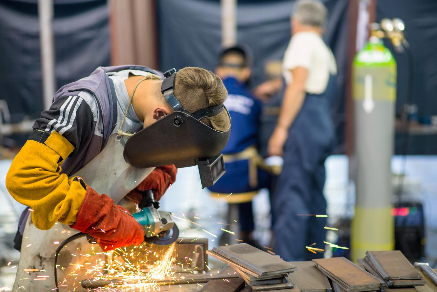 Welder working in a factory