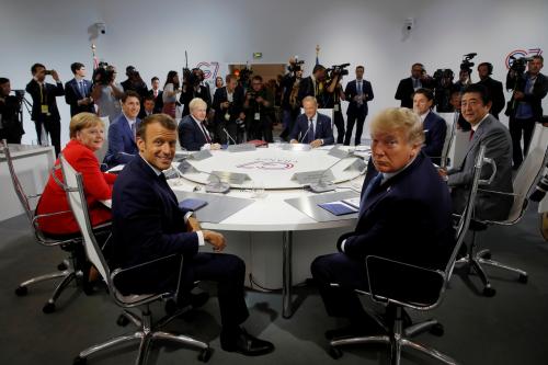 French President Emmanuel Macron, U.S. President Donald Trump, Japan's Prime Minister Shinzo Abe, Britain's Prime Minister Boris Johnson, German Chancellor Angela Merkel , Canada's Prime Minister Justin Trudeau, Italy's acting Prime Minister Giuseppe Conte and European Council President Donald Tusk attend a G7 working session on "International Economy and Trade, and International Security Agenda" during the G7 summit in Biarritz, France, August 25, 2019. REUTERS/Philippe Wojazer/Pool     TPX IMAGES OF THE DAY - RC1E48358030