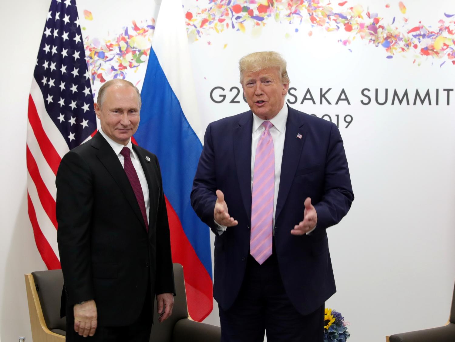 Russia's President Vladimir Putin and U.S. President Donald Trump attend a meeting on the sidelines of the G20 summit in Osaka, Japan June 28, 2019. Sputnik/Mikhail Klimentyev/Kremlin via REUTERS  ATTENTION EDITORS - THIS IMAGE WAS PROVIDED BY A THIRD PARTY. - RC187F8F9730