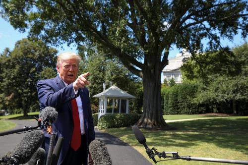 U.S. President Donald Trump speaks to reporters as he departs for travel to the AMVETS convention in Kentucky from the South Lawn of the White House in Washington, U.S. August 21, 2019. REUTERS/Tasos Katopodis - RC1586994E00